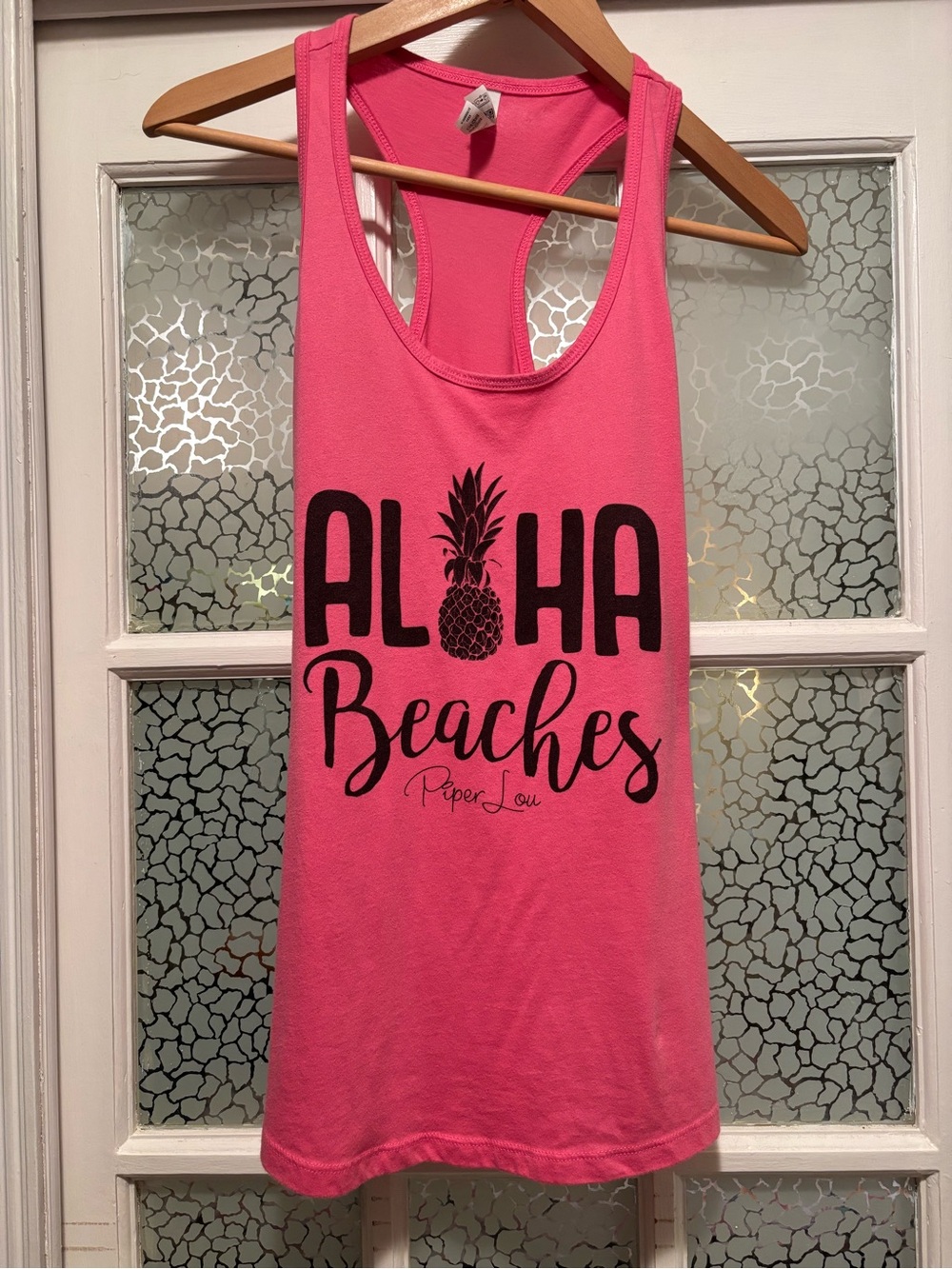 Next Level Apparel Hot Pink Racerback Tank with Black Pineapple Graphic